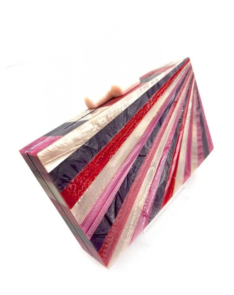 BOLSOS Y CLUTCH DE FIESTA TONOS MAGENTA RAYOS  SOL