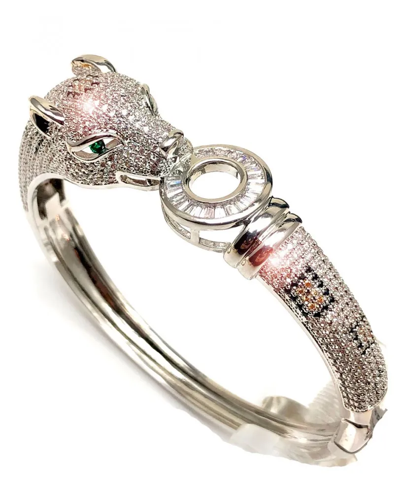 PULSERAS PLATEADAS CON FABULOSA CABEZA FELINA UN CLASICO